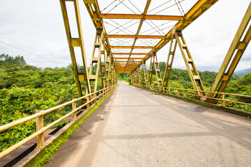 Fototapeta na wymiar Costa Rica bridge over the river bearing structures