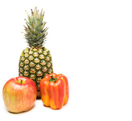 Variegated apple pineapple and pepper red and yellow on white background. Concept of Diversity