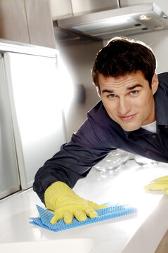 Man cleaning the kitchen