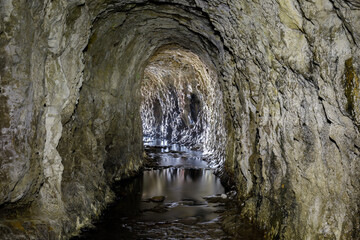 Abandoned Ocean Shore Railroad Creek Tunnel in Davenport, California, USA. Yellow Bank Creek...