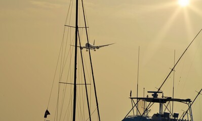 Jet airplane in final approach at a Caribean island