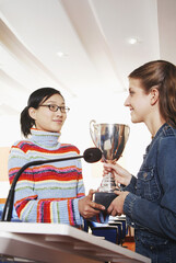 Girl receiving her award