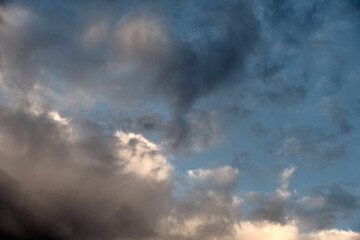 Naklejka na ściany i meble Storm clouds and blue sky .Monsoon storm clouds forming