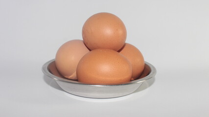 brown eggs in a bowl