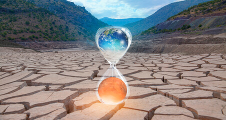 Global warming concept-Planet Earth is becoming a dead planet like Mars - Hourglass inside Planet...