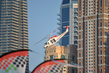 Helicopter inbetween houses © Alexander