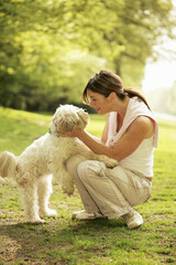 Woman looking at her dog