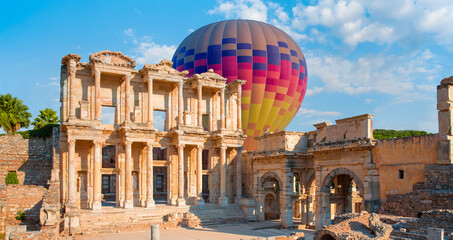Hot air balloon flying over Celsus Library - Ephesus, Selcuk, Turkey