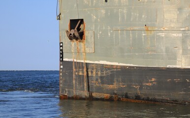 Steel ships hull with anchor 