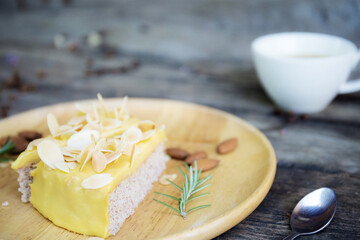 Cake on wooden tray.