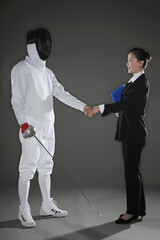 Man shaking hands with a businesswoman