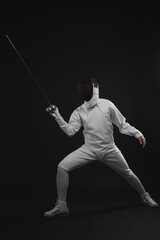 Fototapeta na wymiar Man holding fencing foil