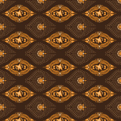 Elegant motifs on Central Java batik design with golden brown color