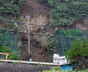 Landslide in Japan caused by heavy rain, a disaster where the cliff has collapsed onto the road...