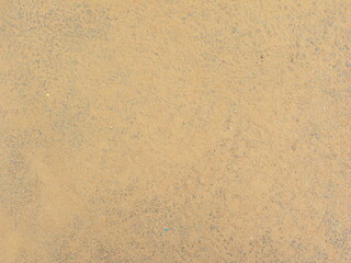 Beige color soil on concrete floor textured background
