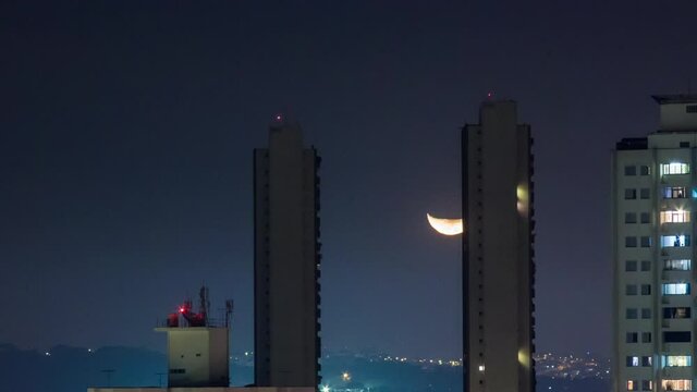 Timelapse of moon setting in the sky, Sao Paulo, Brazil
