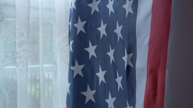dust in the air against the American flag, 1080p video,