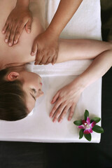 Obraz na płótnie Canvas Woman enjoying a back massage