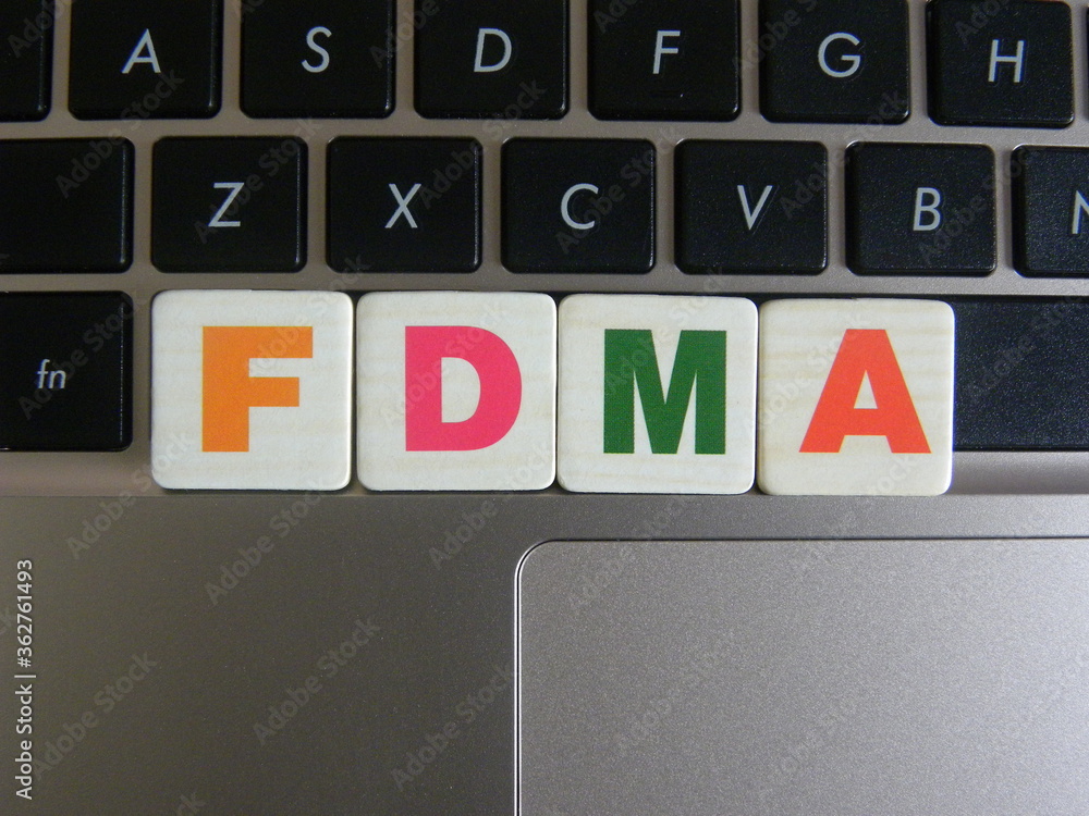 Poster abbreviation fdma (frequency division multiple access) on keyboard background