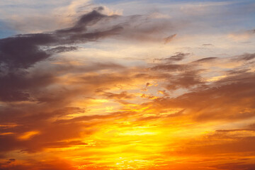 Naklejka na ściany i meble Sunset and beautiful fiery clouds.