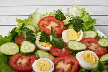 healthy food, cabbage salad with tomatoes, egg and cheese.