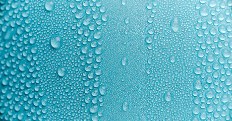 water drops of dew on painted metal surface macro background