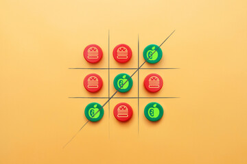 A game of TIC-TAC-toe between healthy and unhealthy food. Choose between fast food and vegetables....