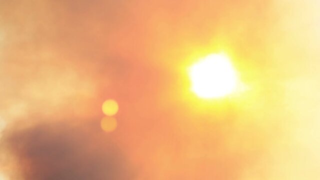 Tilt Up on Wild Fire Smoke and Sun Reno