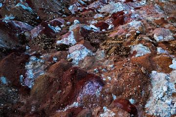 textures of various clay layers underground in  clay quarry after  geological study of  soil. colored layers of clay and stone in  section of  earth, different rock formations and soil layers.
