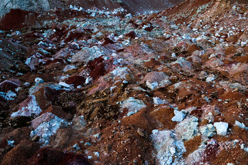 textures of various clay layers underground in  clay quarry after  geological study of  soil. colored layers of clay and stone in  section of  earth, different rock formations and soil layers.