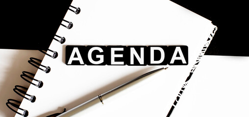 Business Words on notepad. Work business tex AGENDA