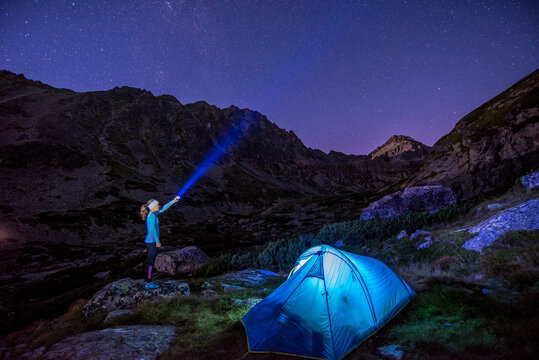 Sunset  in High Tatras mountains national park. Mountain  in Slovakia. Image contains noise due to high ISO and selective focus. Night sky. milky way at campsite, kemping
