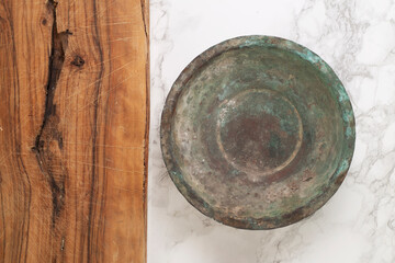 Wooden presentation board and empty bowl