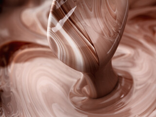 Abstract background, hot, melted chocolate and milk