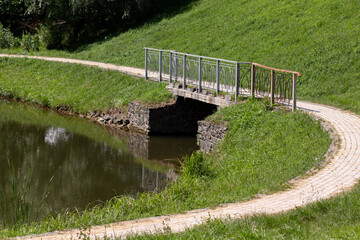 bridge on the lake in the park