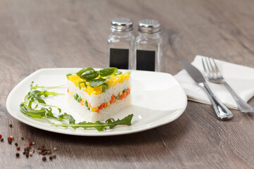 Healthy food. Rise basmati with vegetables. Vegan food. Basmati rice cooked white on wooden table.