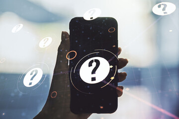 Creative concept of question mark illustration and hand with phone on background. FAQ and search...