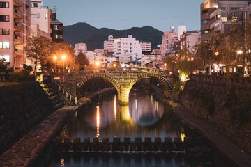 Meganebashi Bridge in the evening. It is often called Spectacles Bridge and it is the most...