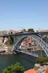Sights and scenes of Porto in Portugal, featuring buildings, river and roads
