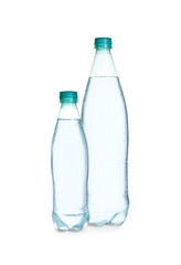 Plastic bottles with pure water on white background