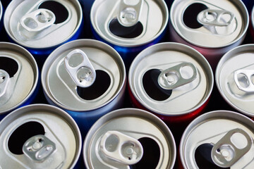 Empty aluminium drink cans recycling background concept