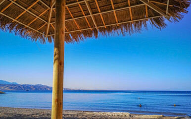 Sunshade on sunny beach of the Red Sea, Middle East