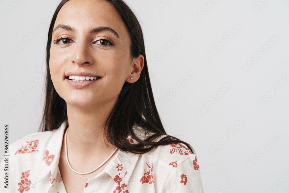 Wall mural photo of happy beautiful woman smiling and looking at camera