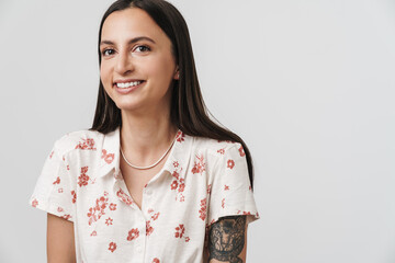Photo of joyful beautiful woman posing and smiling at camera
