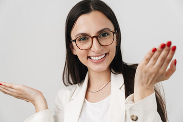 Photo of excited businesswoman in eyeglasses laughing at camera