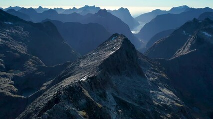 drone shot Milford Sound Gertrude Saddle Fiordland National Park, New Zealand mountains