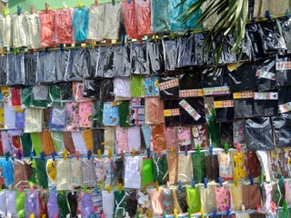 Masker are hanging. Masker are selling in the street during coronavirus pandemic.