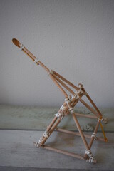 wood and robe miniature object on a wooden table with white background. Wood project with robe. Safe yourself