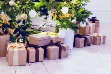 Christmas background, boxes with gifts under the Christmas tree