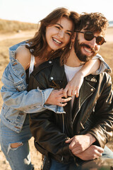 Attractive young happy couple embracing